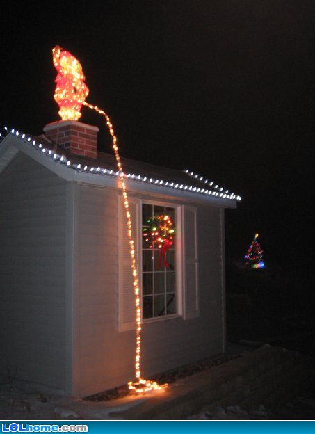 Santa Peeing Off the Roof