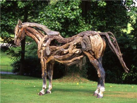 Nature Horses Using Driftwood