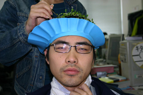 Plant Growing On His Head